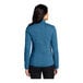 A woman wearing a Port Authority blue heather fleece sweater jacket.