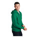 A man wearing a Port & Company full-zip hooded sweatshirt in kelly green.