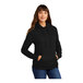 A woman wearing a black Port & Company pullover hoodie.