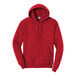 A red Port & Company Core Fleece pullover hoodie with a hood.