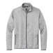 A Port Authority unisex grey fleece sweater jacket with a zipper.