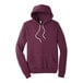 A maroon Bella + Canvas pullover hoodie with white strings.