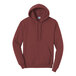 A maroon Port & Company Core Fleece pullover hoodie with a white label.