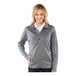 A woman wearing a grey Edwards Performance Tek full-zip sweater/jacket.