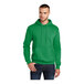 A man wearing a green Port & Company Core Fleece pullover hoodie.