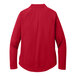 A Port Authority women's red quarter-zip sweatshirt with long sleeves.