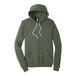 A military green sweatshirt with white strings.