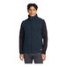A man wearing a blue The North Face fleece vest.