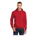 A man wearing a red Port & Company fleece pullover hoodie.