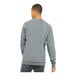 A man wearing a Bella + Canvas grey sponge fleece raglan sweatshirt.