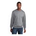 A man wearing an athletic heather Port & Company Core Fleece crewneck sweatshirt.