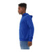 A person wearing a Bella + Canvas blue Sponge Fleece pullover hoodie.