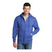 A man wearing a Port & Company heather royal full-zip hoodie.