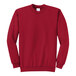 A red Port & Company core fleece sweatshirt.