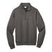 A grey Port & Company quarter-zip sweatshirt.