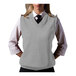 A woman wearing an Edwards gray heather jersey knit vest with a tie.