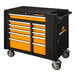 A black and yellow tool cabinet with wheels.