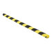 A black and yellow striped Vestil polyurethane foam edge guard with a slot.