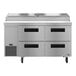 A Hoshizaki stainless steel refrigerated pizza prep table with four drawers.