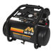 A black Mi-T-M Work Pro Series air compressor with gauges and a handle.