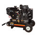 A black Mi-T-M portable gas air compressor with a black engine.