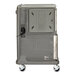 A gray Cambro Pro Cart Ultra pan carrier with rubber casters.