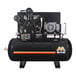 A black air compressor with a hose attached.