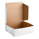 A white Southern Champion cake box with a brown lid.