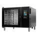 A black Blodgett Invoq electric combi oven with electronic controls and a glass door.