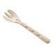 A World Centric compostable fiber serving fork with a carved design.