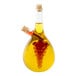 A glass oil cruet with a cork filled with yellow liquid.