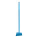 A blue plastic Vikan broom head with long bristles.