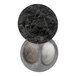 A black marble salt cellar with two compartments.