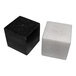 Two black and white marble cubes, one black and one white.