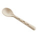 A World Centric compostable fiber serving spoon with a wooden handle.