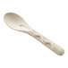 A World Centric compostable fiber spoon with a white handle.