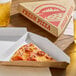 A single slice of pepperoni pizza in a kraft clay-coated clamshell pizza slice box on a wooden table.