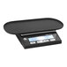 A black Rhino Coffee Gear digital coffee scale on a counter with a digital display.