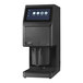 A black Pacojet 4 food processing machine with a screen on it.