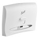A white plastic Scott® Series I surface-mounted toilet seat cover dispenser.