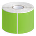 A roll of Lavex fluorescent green rectangular inventory labels with white stripes.