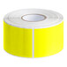 A roll of yellow rectangular Lavex inventory labels.