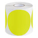 A roll of white and chartreuse Lavex round inventory labels with circles.