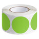 A roll of green circles on a white background.