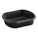 A Pactiv black plastic MealMaster container with a lid.