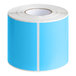 A roll of sky blue rectangular Lavex labels with a brown border.
