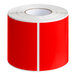 A roll of red and white Lavex rectangular labels.