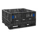 A black plastic crate with blue handles.