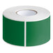 A roll of green Lavex rectangular inventory labels with white paper.