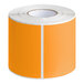 A roll of Lavex fluorescent orange rectangular peel and stick labels.